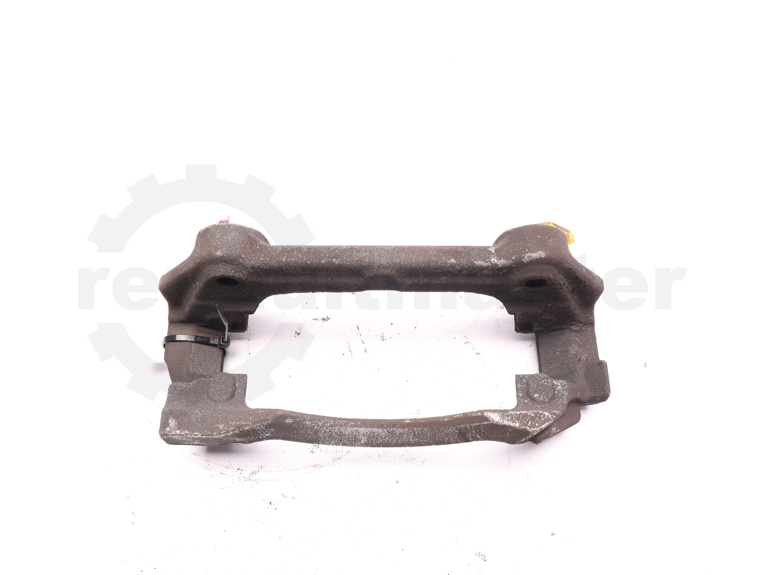 Скоба супорта гальмівного переднього ліва Renault Trafic (Opel Vivaro, Nissan NV300) 2014 -, 410157795R Б/В